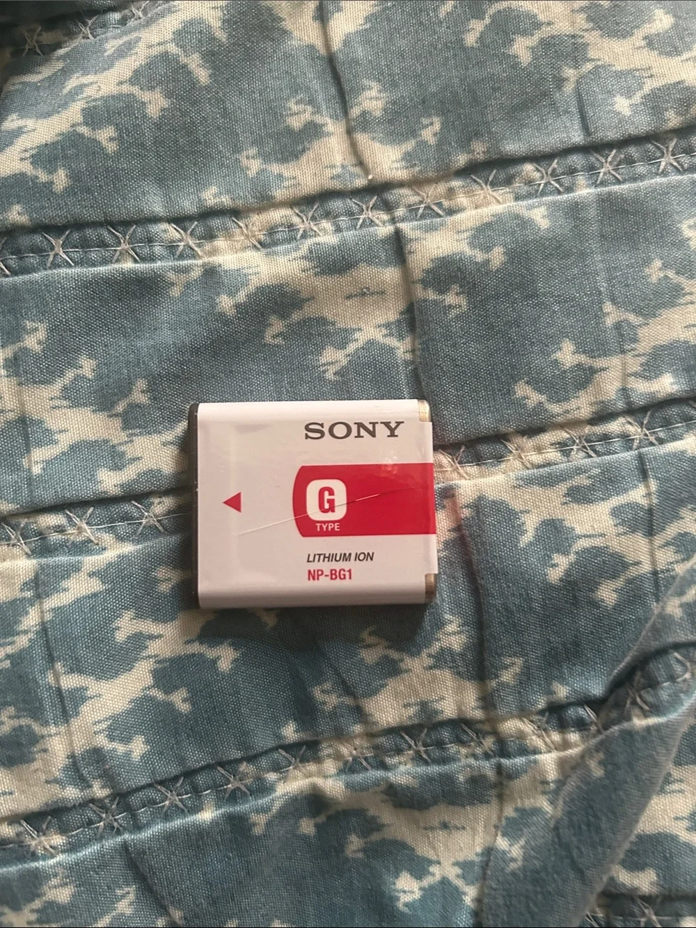 Sony NP-BG1 Camera Battery — White with Red Accent